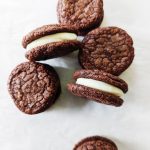 12 days of christmas baking -- brownie sandwich cookies with eggnog buttercream