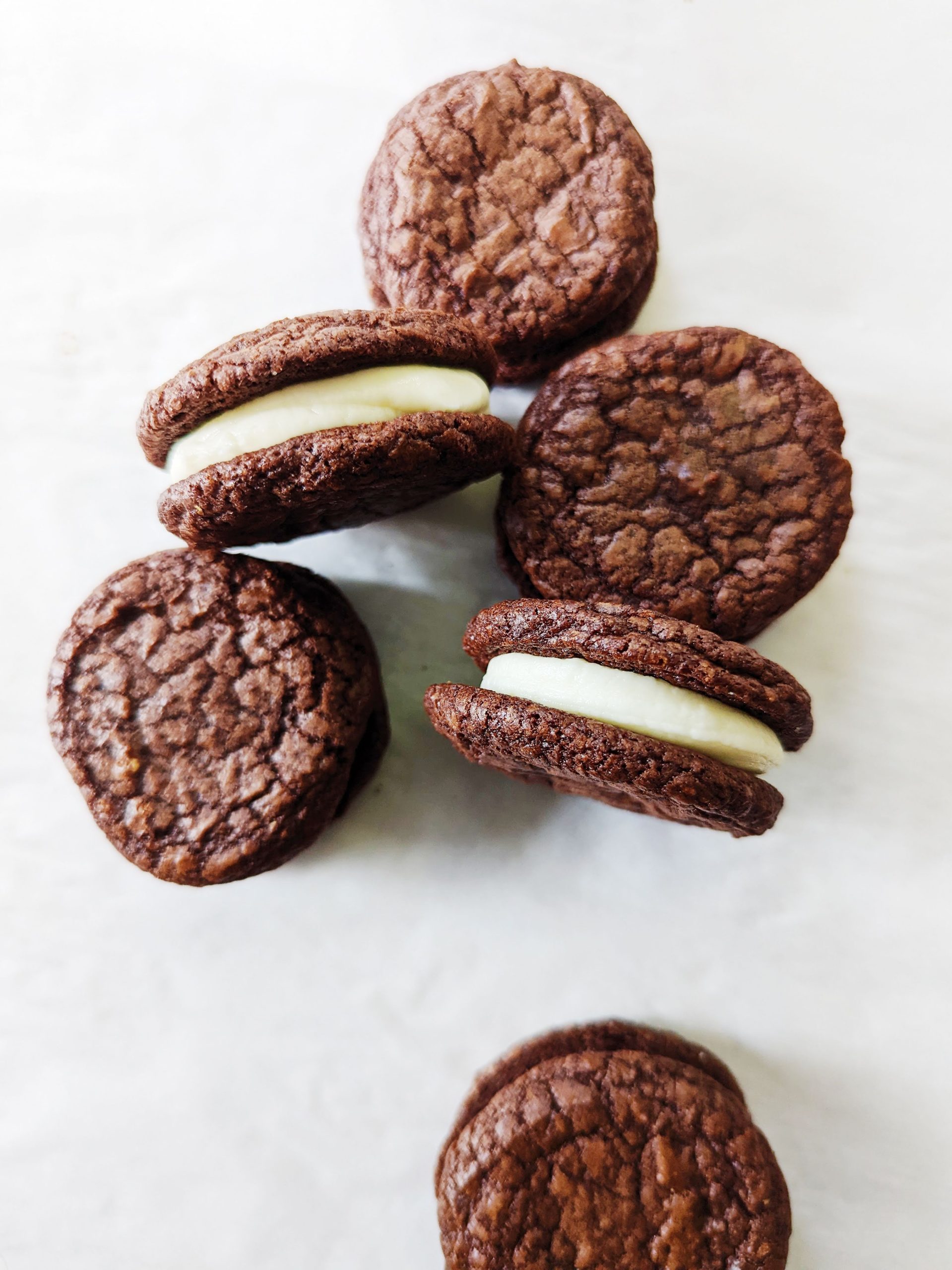 12 days of christmas baking -- brownie sandwich cookies with eggnog buttercream