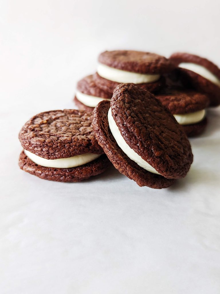 12 days of christmas baking -- brownie sandwich cookies with eggnog buttercream